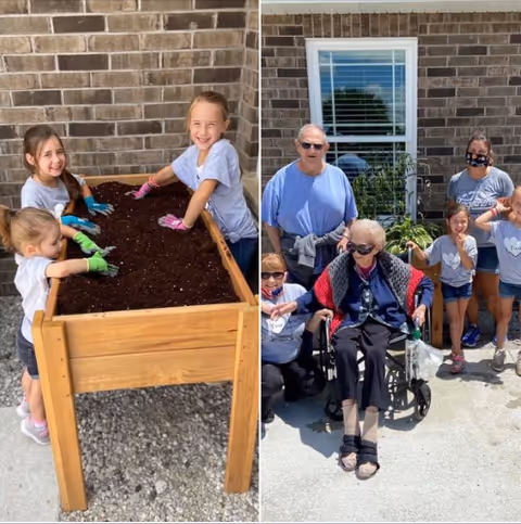 Two images side by side: On the left, three young children wearing gloves are playing with soil in a raised wooden garden bed against a brick wall. On the right, a group of people including an elderly woman in a wheelchair, two adults, and three children are posing outside in front of a window with plants nearby. The elderly woman is wearing sunglasses and a shawl, and one adult is wearing a face mask.