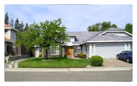 Montclair Villa exterior: a single-story building with a manicured lawn, driveway, and trees.