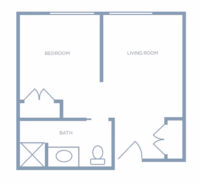 A simple architectural floor plan showing a one-bedroom apartment layout with a bedroom, living room, and bathroom. The bathroom includes a shower, sink, and toilet. The entrance leads into the living room, and there is a closet near the entrance.