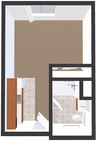Top-down floor plan of a studio apartment showing a main living area, kitchenette along the left side, and a separate bathroom.