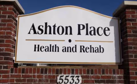 Brick entrance sign reads Ashton Place Health and Rehab.
