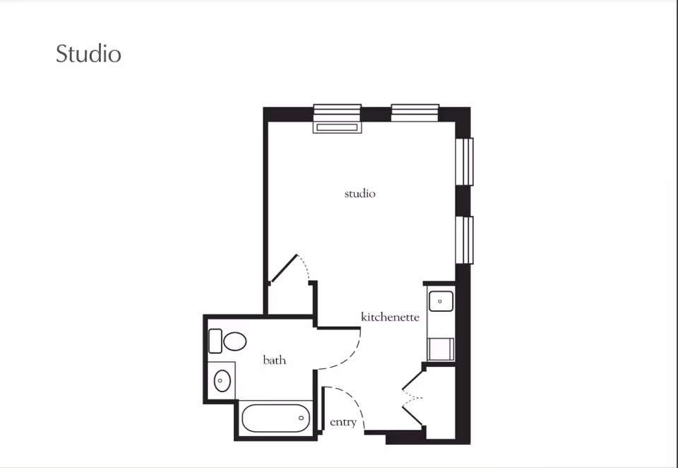 Floor plan of a studio apartment at Atria Bay Shore showing a studio living area, kitchenette, bathroom with toilet, sink, and bathtub, and an entry area.
