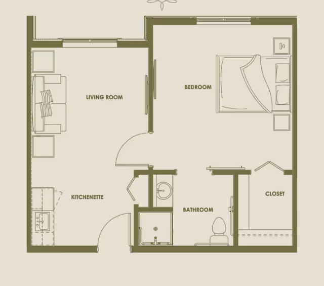 Floor plan of a senior living unit at Spring Gardens Senior Living Meridian showing a living room with a sofa and kitchenette, a bedroom with a bed and nightstand, a bathroom with a toilet and sink, and a closet.