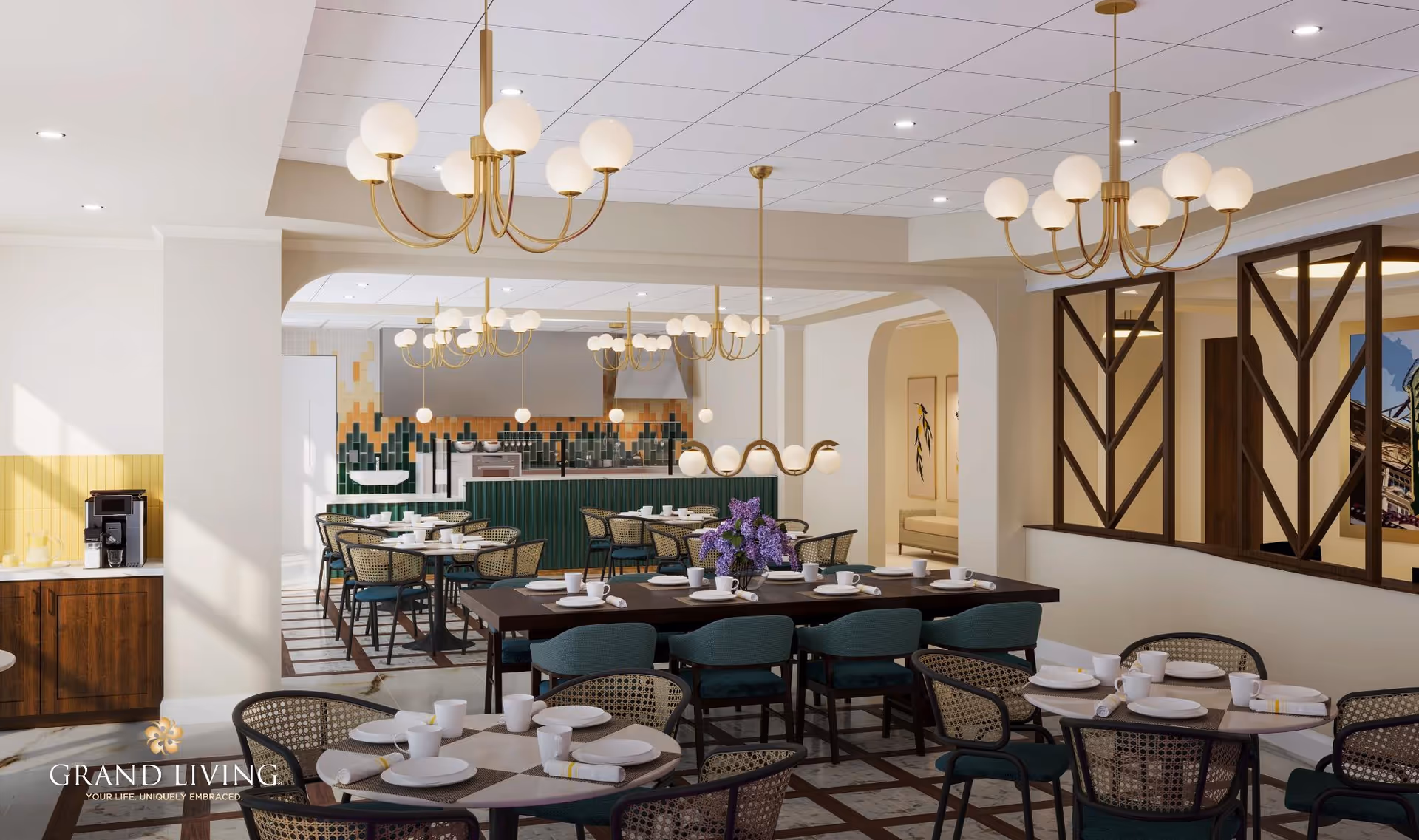 A bright and elegant dining room in a senior living facility with multiple tables set with white plates, cups, and napkins. The room features modern chandeliers with globe lights, a coffee machine on a wooden counter, and a kitchen area with green and yellow tiled backsplash visible in the background. The space is decorated with a vase of purple flowers on a central table and has a warm, inviting atmosphere.