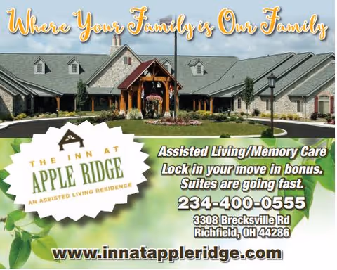 Exterior view of a stone and wood assisted living facility building with a well-maintained lawn and a covered entrance. Text overlay reads 'Where Your Family is Our Family' and provides contact information for The Inn at Apple Ridge, an assisted living and memory care residence.