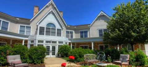 Brookdale Ann Arbor building with arched front entrance and surrounding outdoor seating.