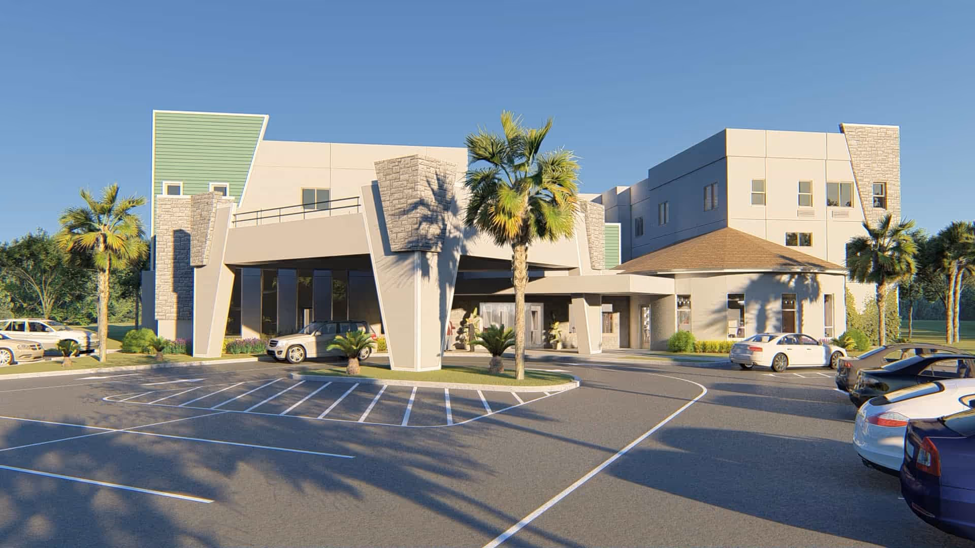 Exterior view of a modern senior living facility building with a covered entrance, palm trees, and a parking lot with several cars parked. The building has multiple floors and a mix of stone and light-colored walls under a clear blue sky.