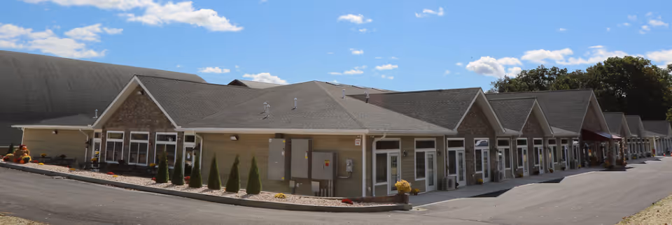 Parkland Manor exterior: long row of single-story buildings with gabled roofs.