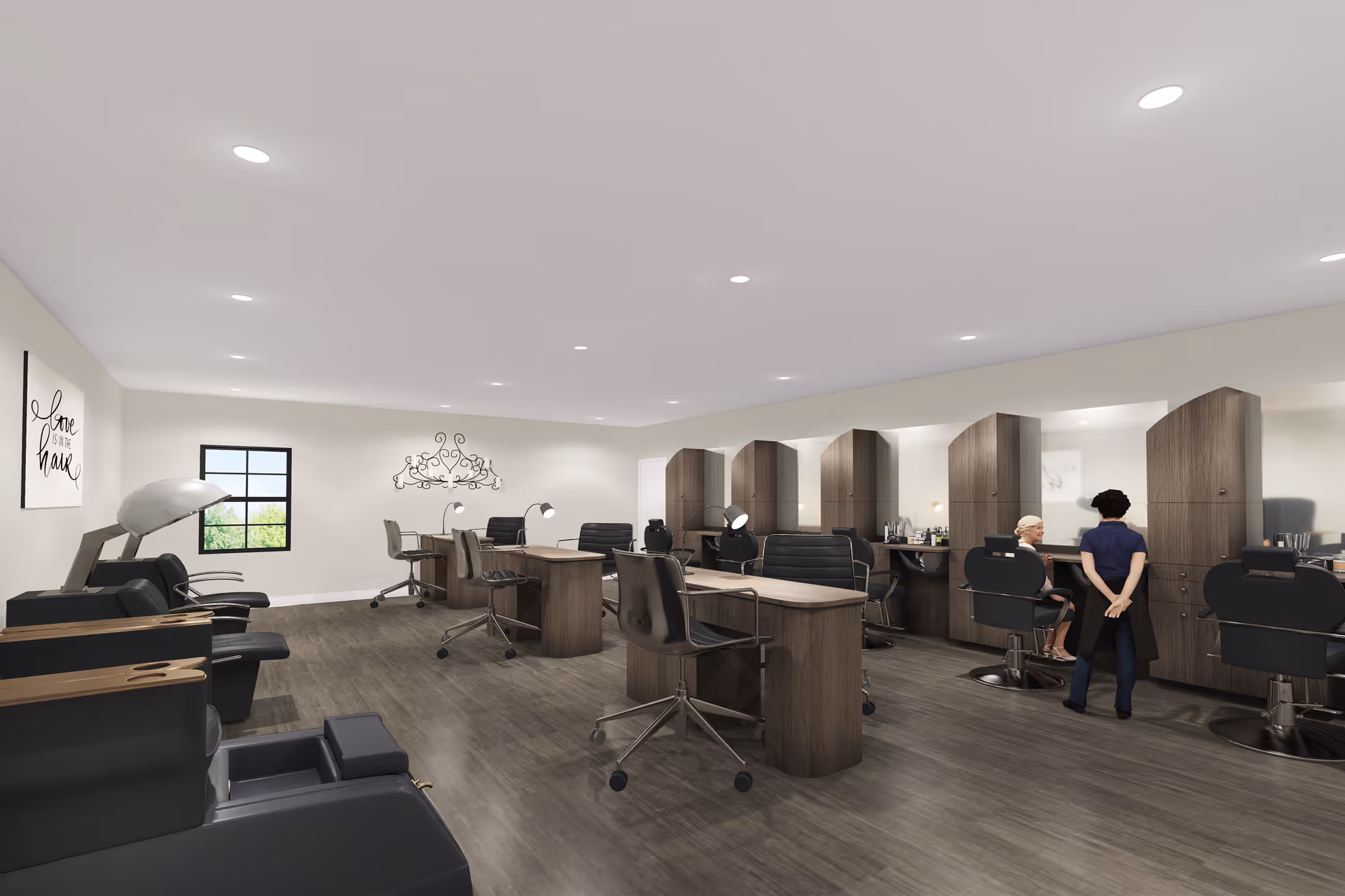 Interior view of a modern salon area with multiple styling stations and chairs. There are two people visible, one seated and one standing, engaged in a hair styling activity. The room has wood flooring, neutral-colored walls, recessed lighting, and decorative wall art. A window on the left side lets in natural light.