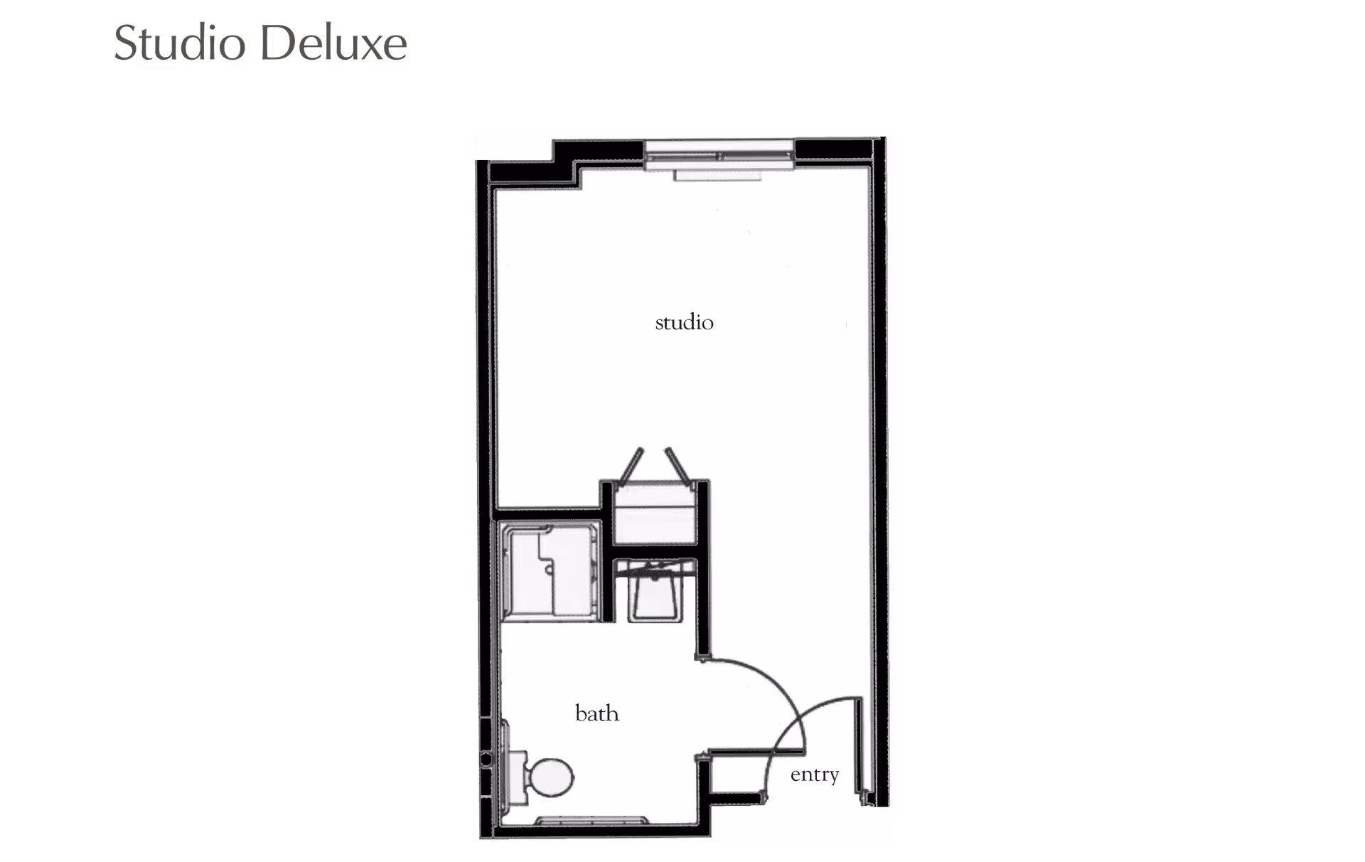Floor plan layout of a Studio Deluxe apartment featuring a main studio living area, a bathroom with a toilet and shower, and an entryway.
