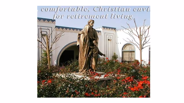 Bronze statue of a man and child surrounded by red flowers in front of a white building with arched doorways and windows, with leafless trees and a blue sky in the background. Text at the top reads 'comfortable, Christian envi for retirement living'.