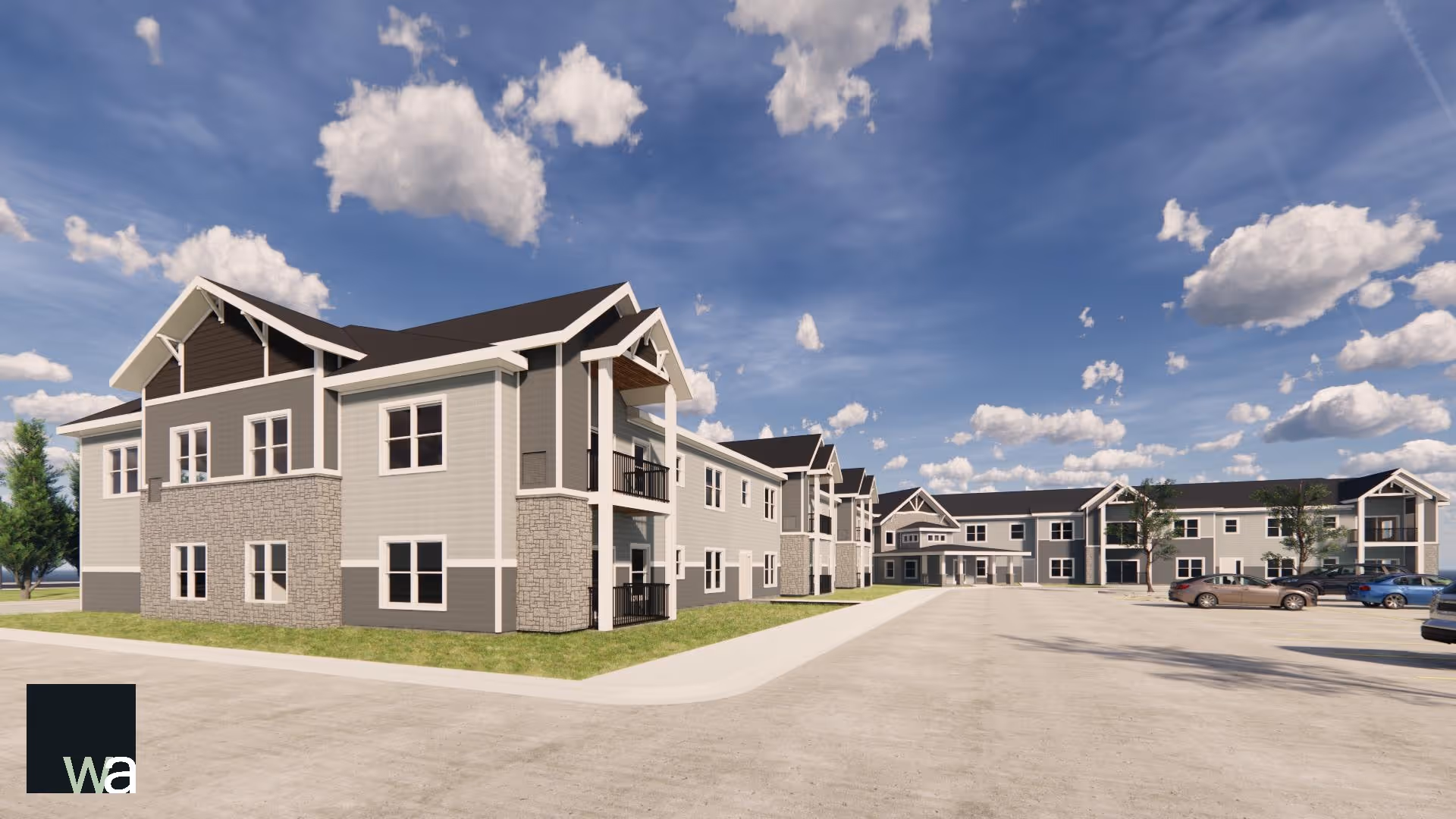 Exterior view of a two-story senior living community building with a parking lot under a blue sky.
