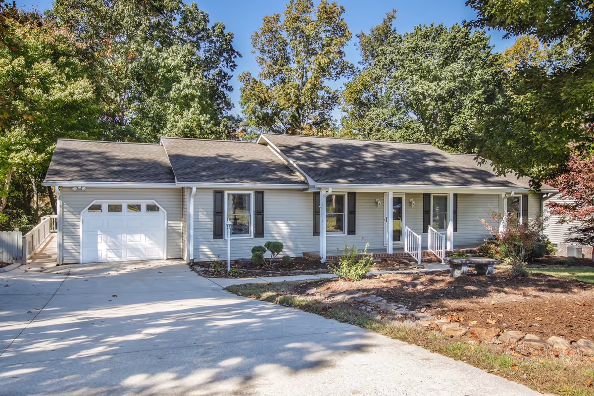 Front view of Edna's Place: a single-story residence with garage and entry porch.