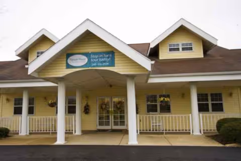 Exterior view of Tipton Place building front with covered entrance and pillars