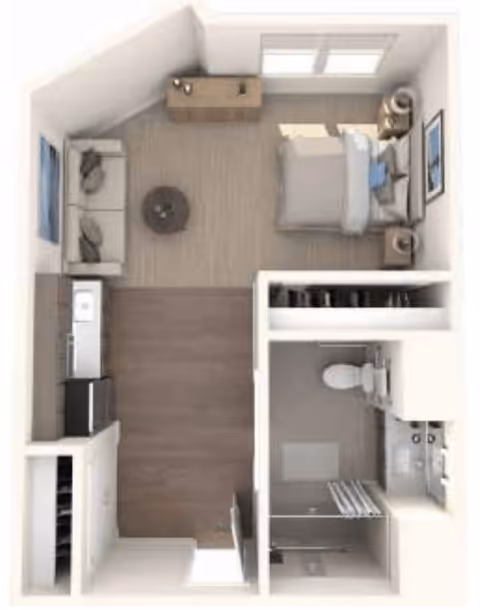 Top-down view of a studio apartment floor plan featuring a combined living and sleeping area with a bed, nightstands, a sofa, and a coffee table. The kitchen area includes a sink, stove, and refrigerator. There is a separate bathroom with a toilet, sink, and shower.