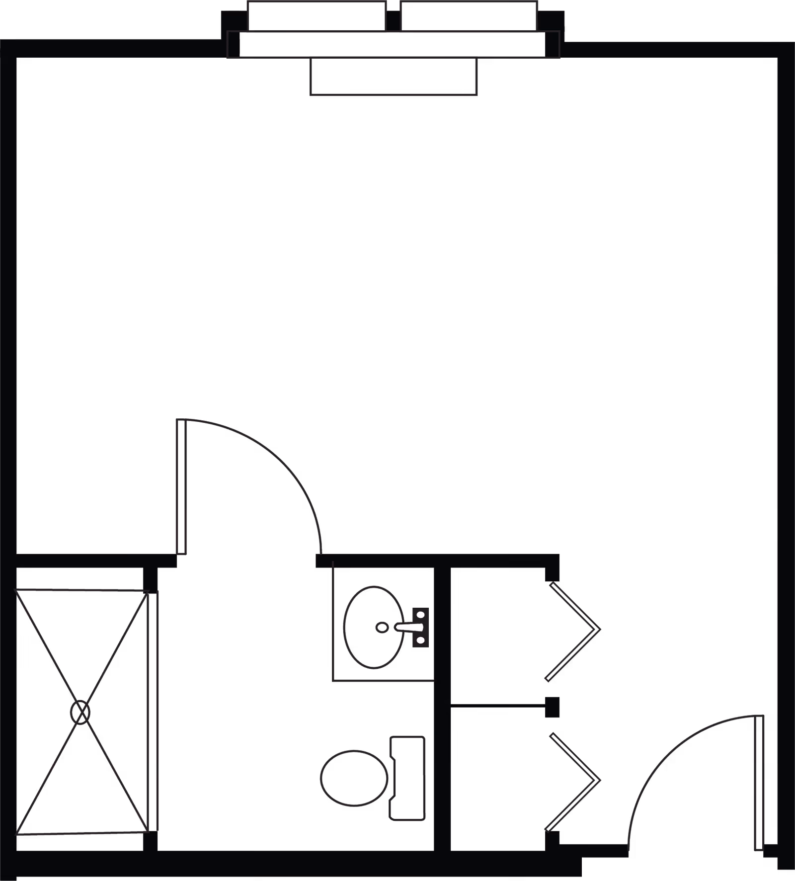 Floor plan of a small living space featuring a main room with a window, a bathroom with a toilet and sink, and a shower area.