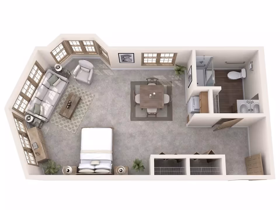 3D floor plan of a senior living studio apartment at Lakeshore Manor featuring a combined living and sleeping area with a bed, sofa, armchair, coffee table, and TV stand. There is a dining area with a square table and four chairs, a small kitchenette with a refrigerator and cabinets, and a bathroom with a shower, toilet, and double sink. Multiple windows provide natural light, and there are plants and framed pictures for decoration.