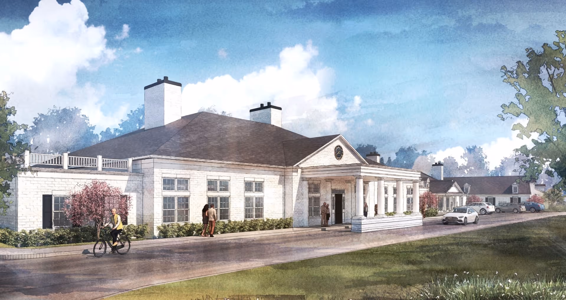 Exterior view of a senior living facility building with white walls, multiple chimneys, and a large covered entrance supported by columns. There are several people outside, including a person riding a bicycle and others walking or standing near the entrance. Cars are parked along the driveway, and trees and shrubs surround the building under a partly cloudy blue sky.