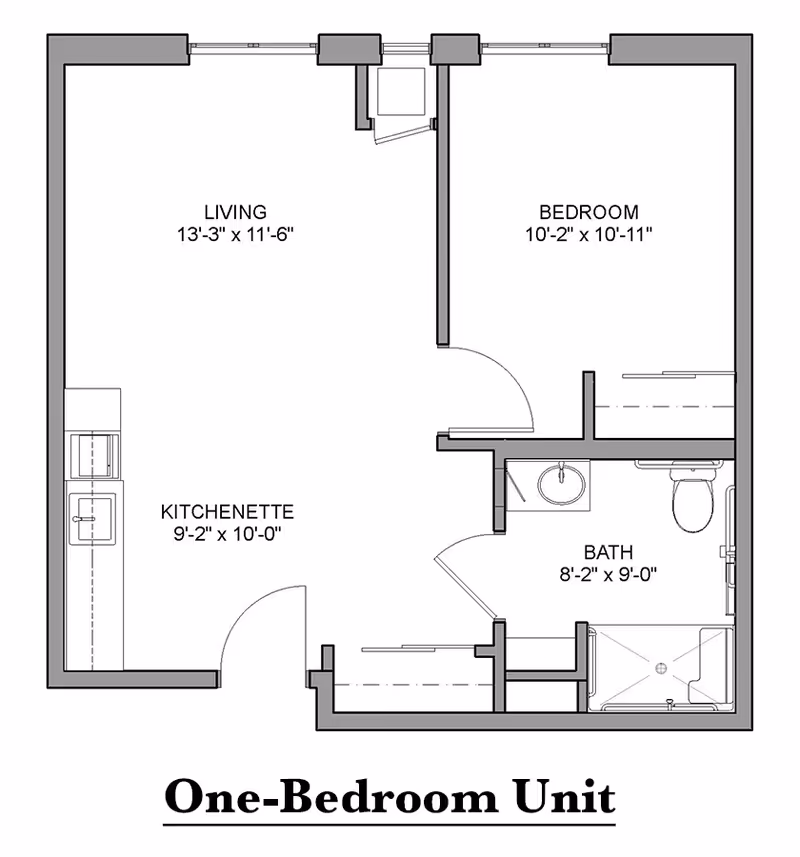 Architectural floor plan of a one-bedroom unit showing a living area, kitchenette, bedroom, and bathroom with dimensions.
