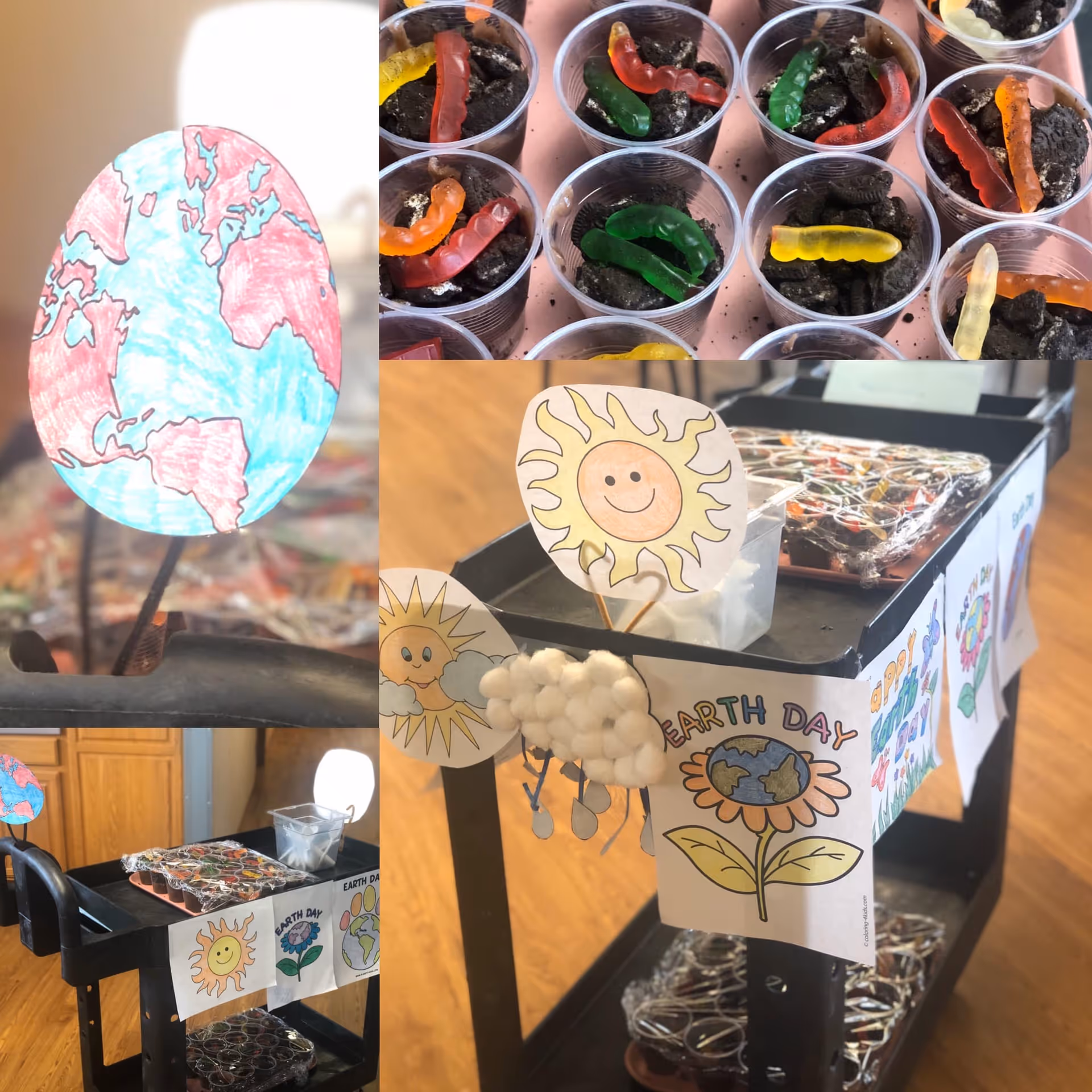 Cart filled with Earth Day crafts and seed cups topped with gummy worms, decorated with paper suns, earth drawings, and cotton-clouds.