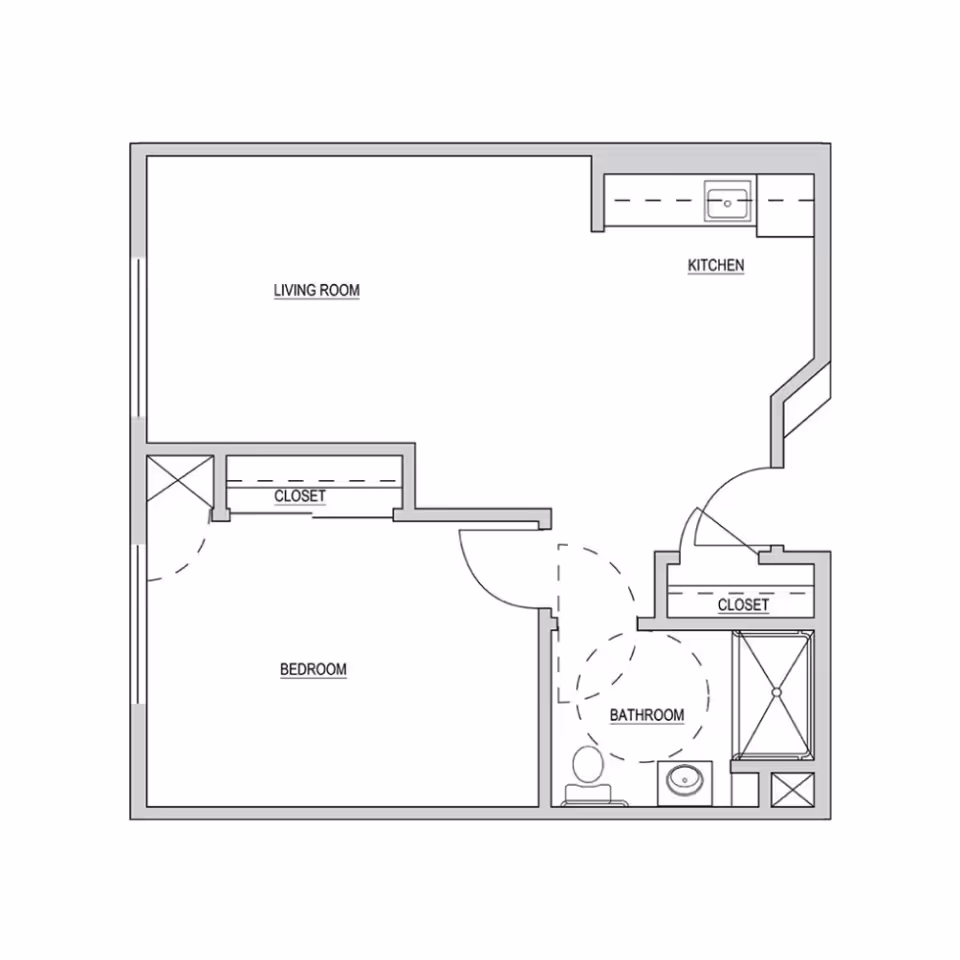 Architectural floor plan of a one-bedroom apartment showing a living room, kitchen, bedroom with closet, bathroom with toilet, sink, and shower, and an additional closet near the entrance.