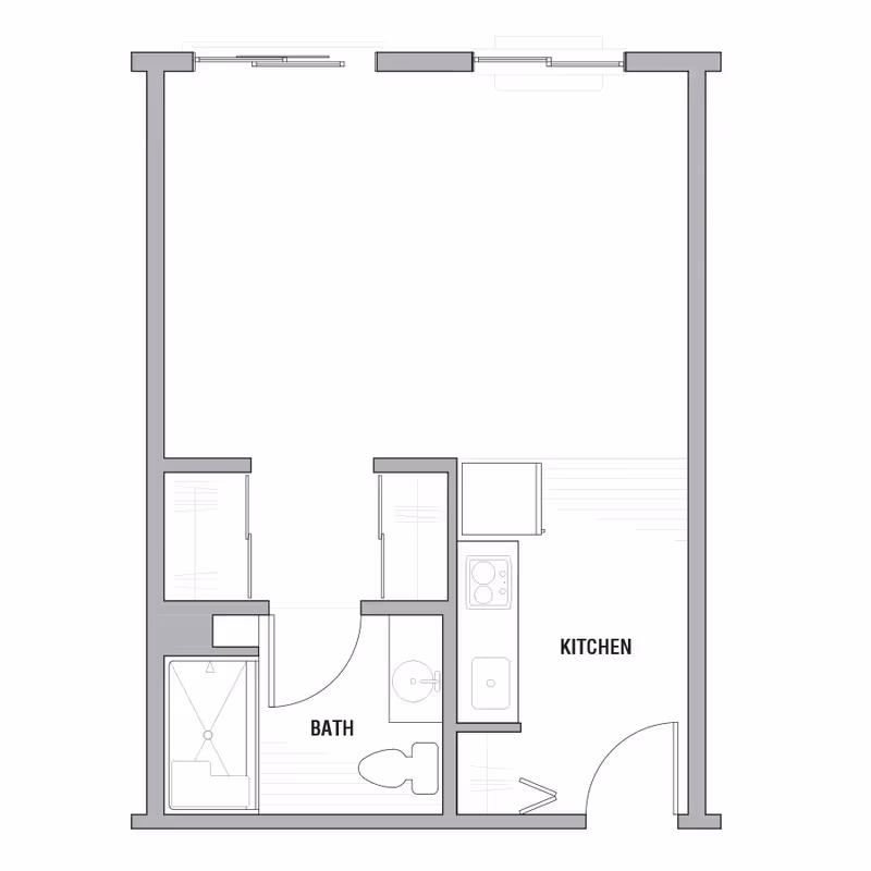 Simple architectural floor plan of a studio-style unit labeled 'Kitchen' and 'Bath' showing an entry door, kitchenette, bathroom fixtures and two closets.