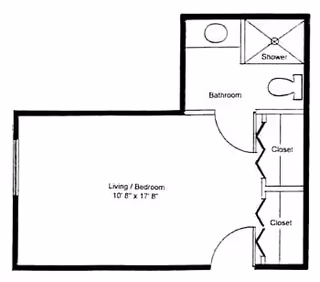 Black and white floor plan of a small living/bedroom area measuring 10 feet 8 inches by 17 feet 8 inches, with an attached bathroom that includes a shower, toilet, and sink. There are two closets located near the entrance to the bathroom.