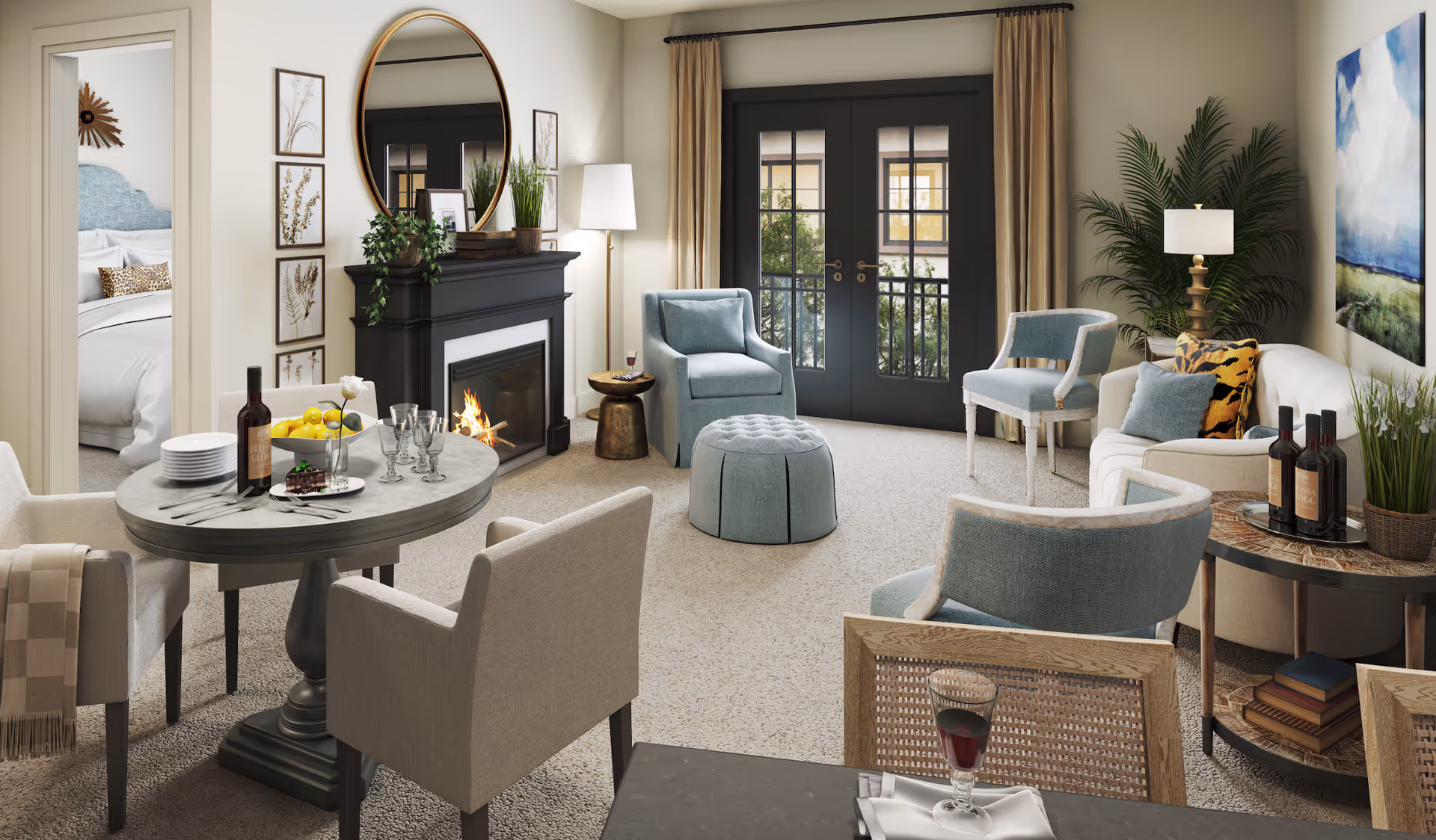 A cozy living room in Weatherly Inn Renton featuring a round dining table with chairs, a fireplace with a round mirror above it, comfortable armchairs, a white sofa with decorative pillows, a side table with wine bottles, and large glass doors leading outside. A bedroom is visible through an open door on the left.