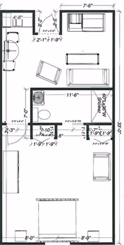Black-and-white floor plan of a small apartment showing a living area, bathroom, kitchenette, bedroom, furniture, and dimension annotations.