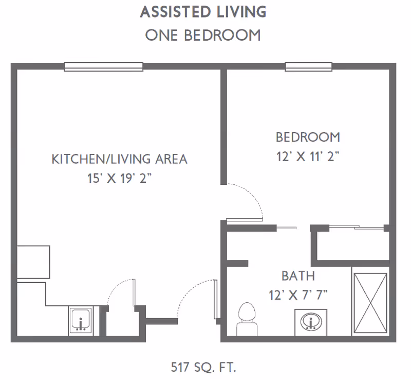Floor plan of an assisted living one-bedroom apartment showing a kitchen/living area measuring 15 feet by 19 feet 2 inches, a bedroom measuring 12 feet by 11 feet 2 inches, and a bathroom measuring 12 feet by 7 feet 7 inches, with a total area of 517 square feet.