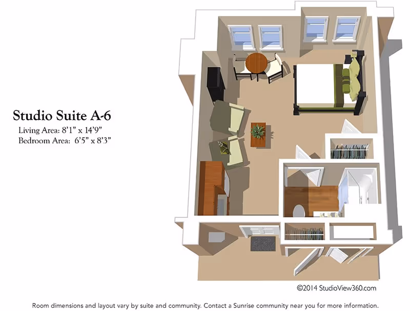 3D floor plan of Studio Suite A-6 at Sunrise at Reston Town Center showing a living area with sofa, armchair, coffee table, TV, and a small dining table with two chairs. The bedroom area has a bed with pillows and a closet. The bathroom includes a shower, toilet, and sink. The entrance area has a closet and a small hallway.