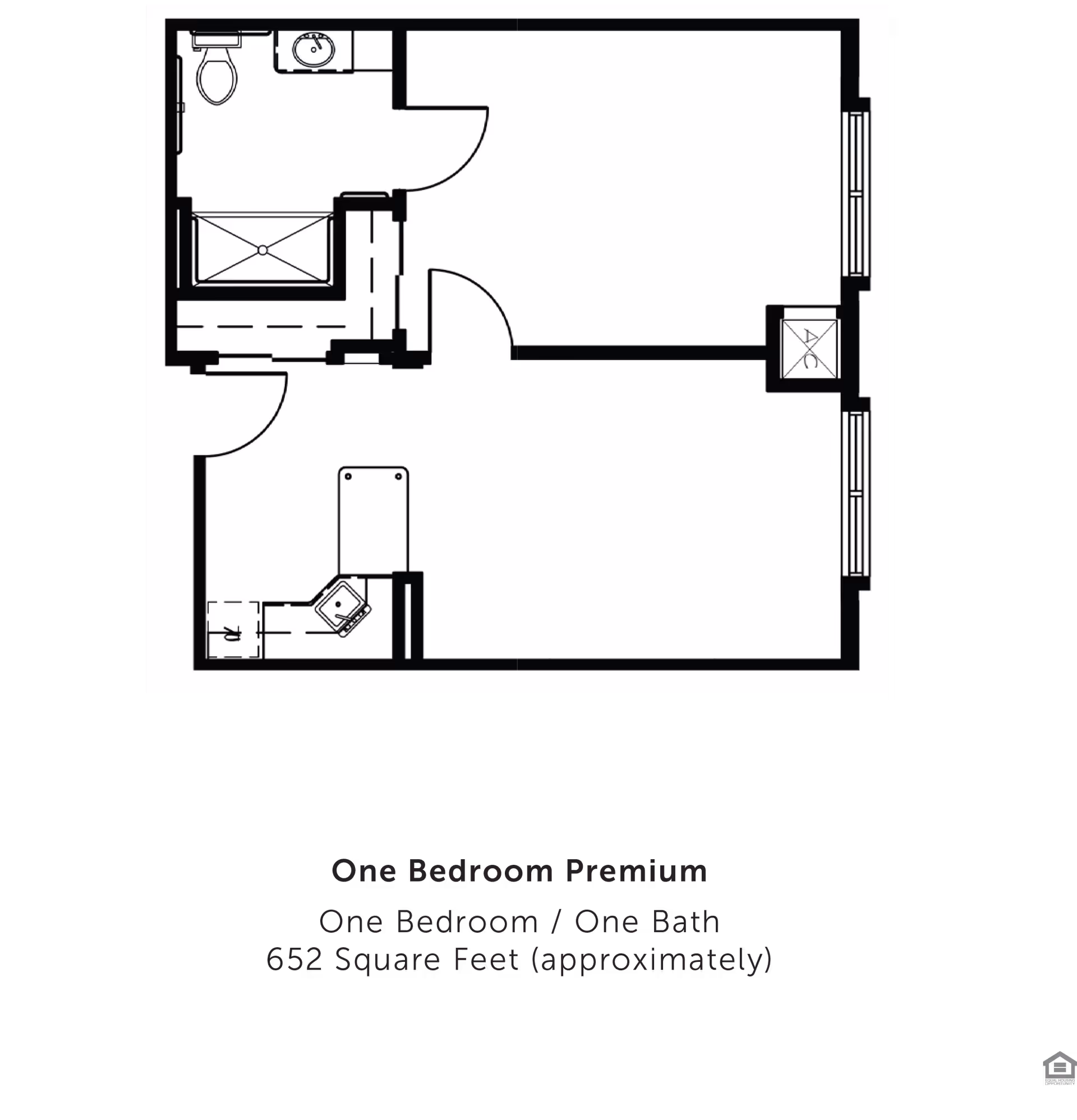 Floor plan layout of a one bedroom premium apartment with one bedroom, one bathroom, and approximately 652 square feet of space. The layout shows a bathroom with a toilet, sink, and shower, a kitchen area, and a living/bedroom space.