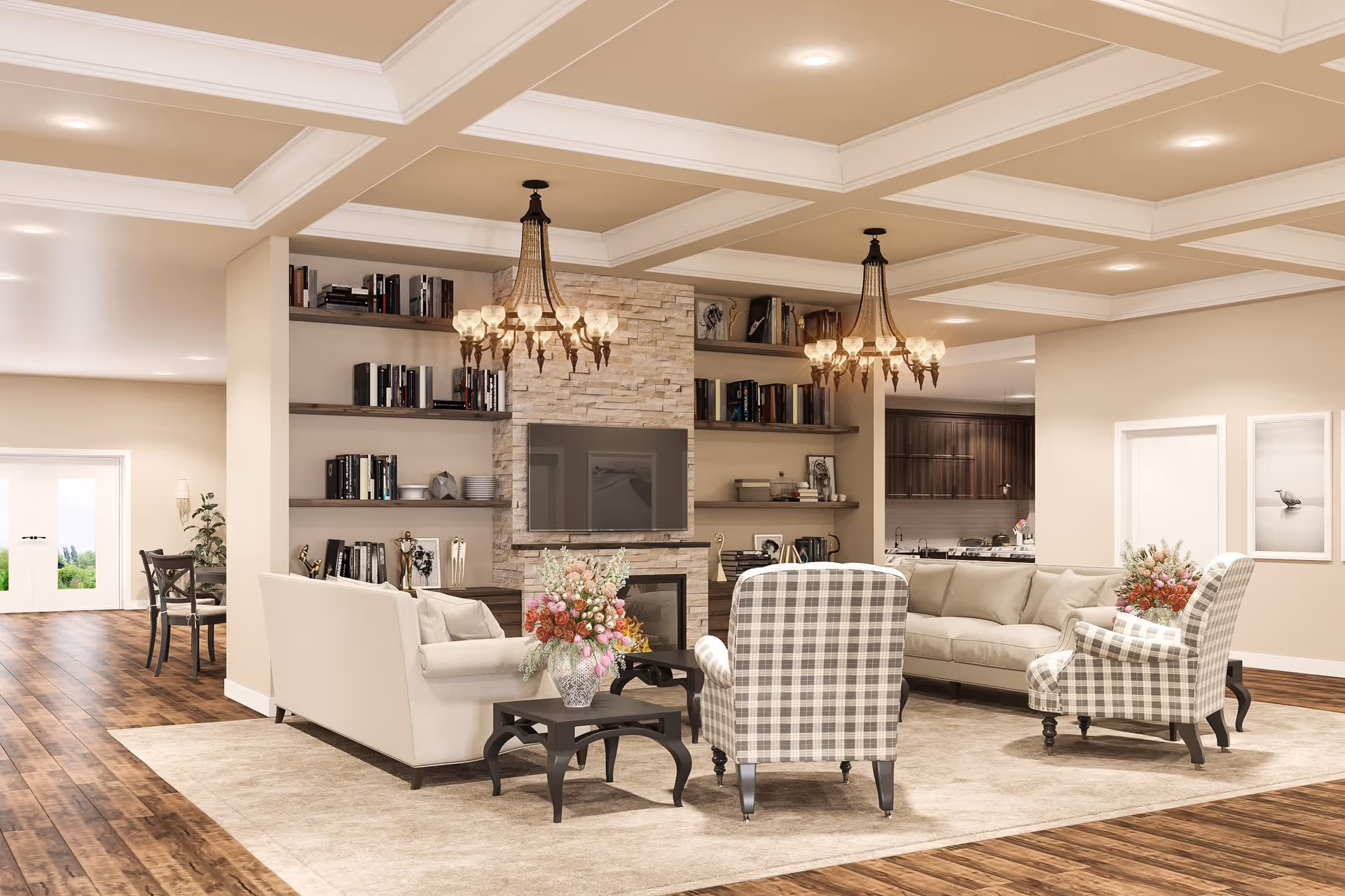 Spacious, well-lit living room with sofas, plaid armchairs, coffee tables, built-in bookshelves, a wall-mounted TV, chandeliers, and floral arrangements.
