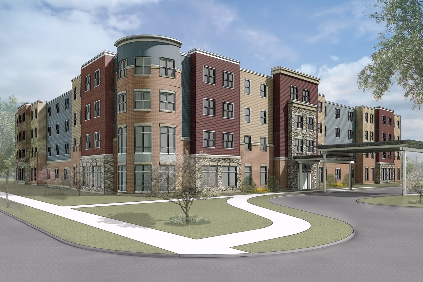 Exterior view of a modern, multi-story senior living facility with a mix of brick, stone, and siding finishes. The building has multiple windows and a covered entrance driveway. There are sidewalks, grass, and a few small trees in the landscaped area around the building under a partly cloudy sky.