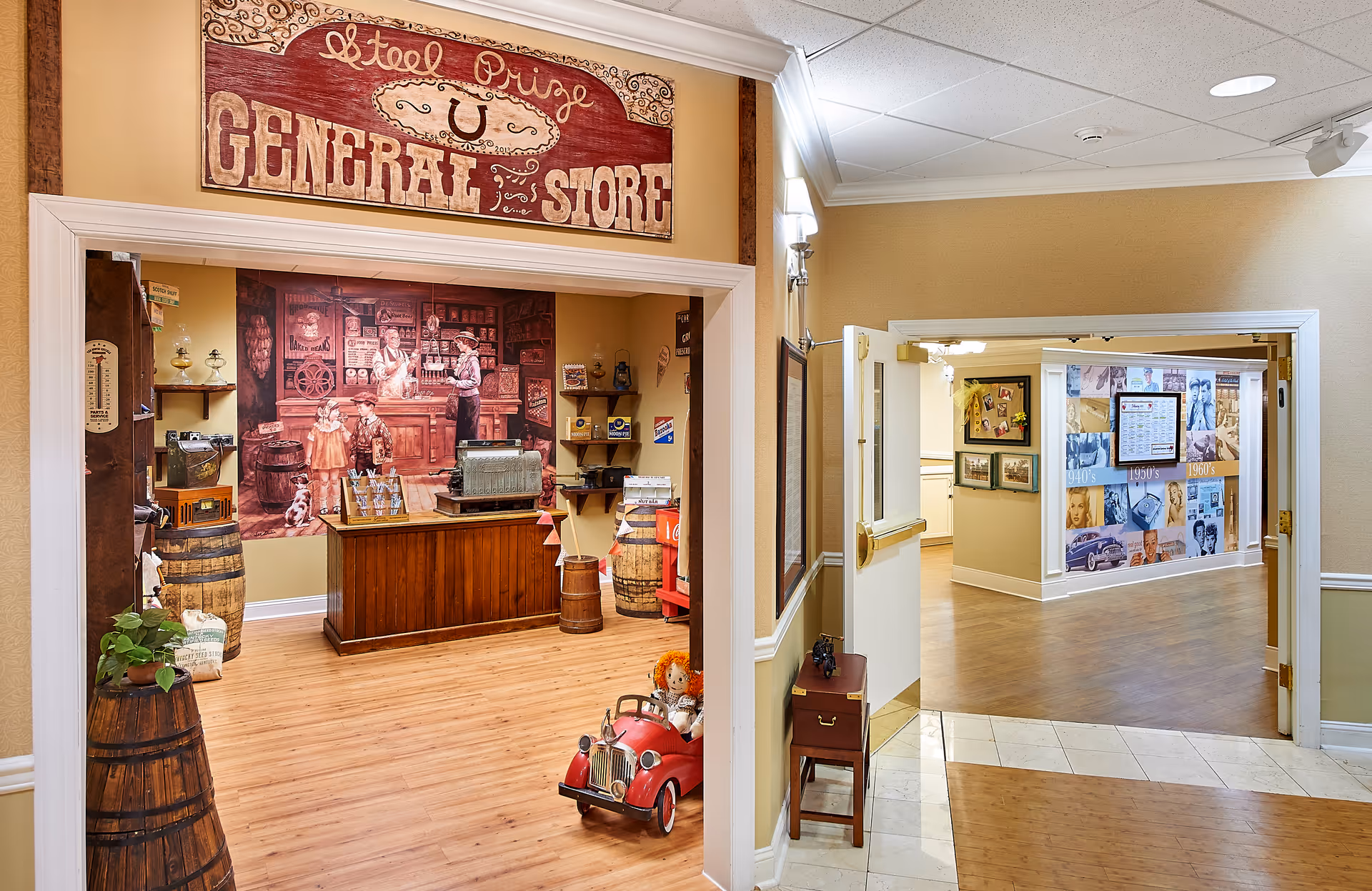 Interior view of a rustic general store setup inside a senior living facility’s hallway.