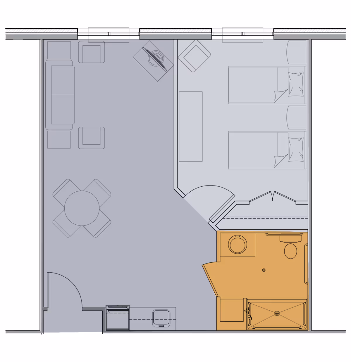 Floor plan of an assisted living unit at Auburn Assisted Living showing a living room with sofa, chairs, and a round dining table, a bedroom with two beds and a chair, and a bathroom with a shower, toilet, and sink.
