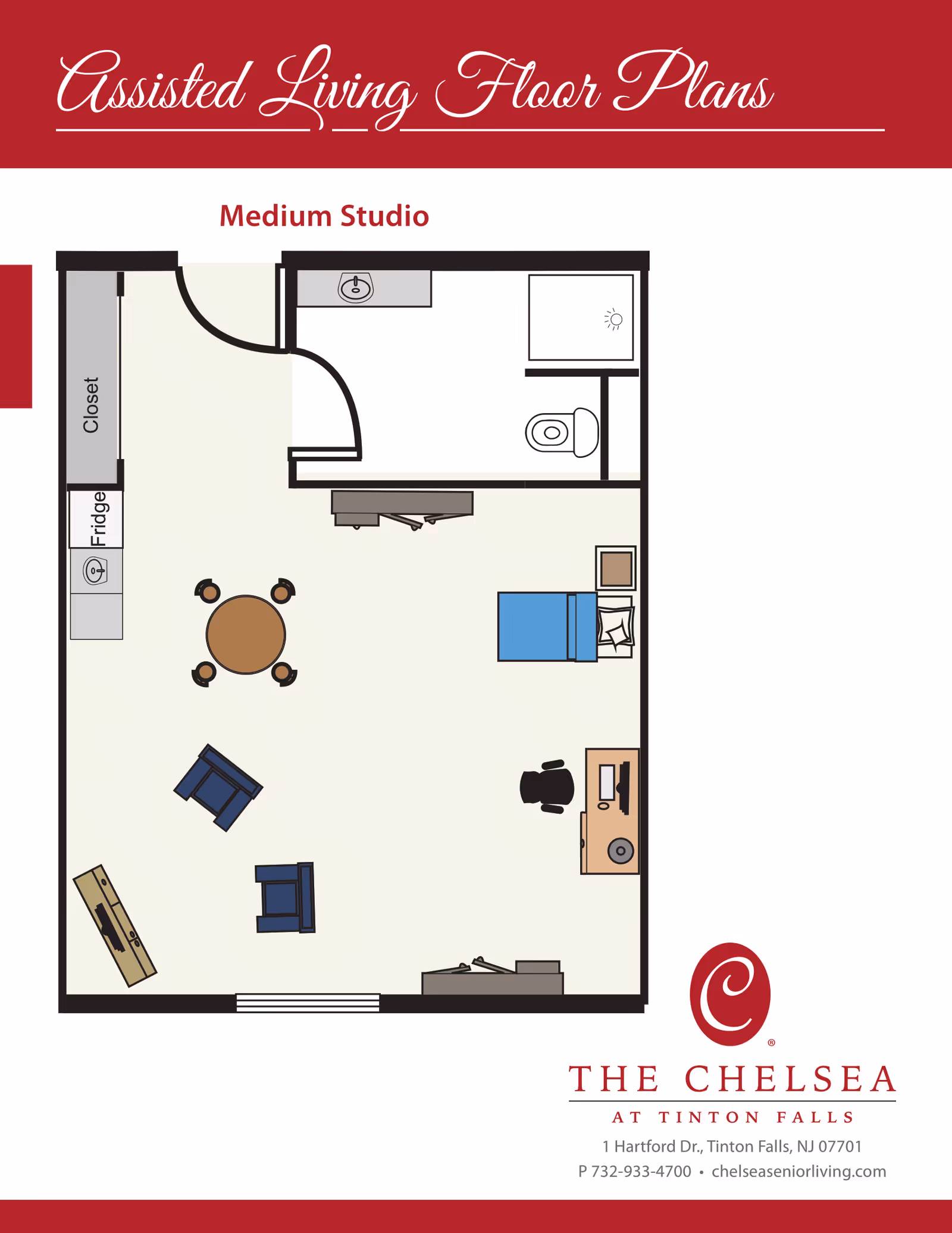 Floor plan of a Medium Studio assisted living apartment at The Chelsea at Tinton Falls, showing a combined living and sleeping area with a bed, desk, two chairs, a round dining table with four chairs, a closet, a small kitchenette with a fridge and sink, and a bathroom with a sink, toilet, and shower.