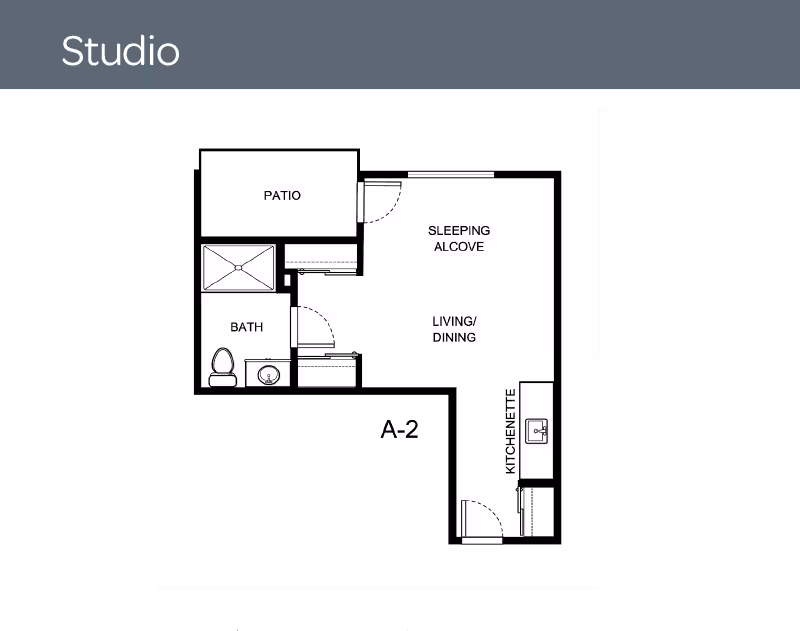 Floor plan of a studio apartment labeled A-2 showing a patio, sleeping alcove, living/dining area, kitchenette, and a bathroom with a shower, toilet, and sink.