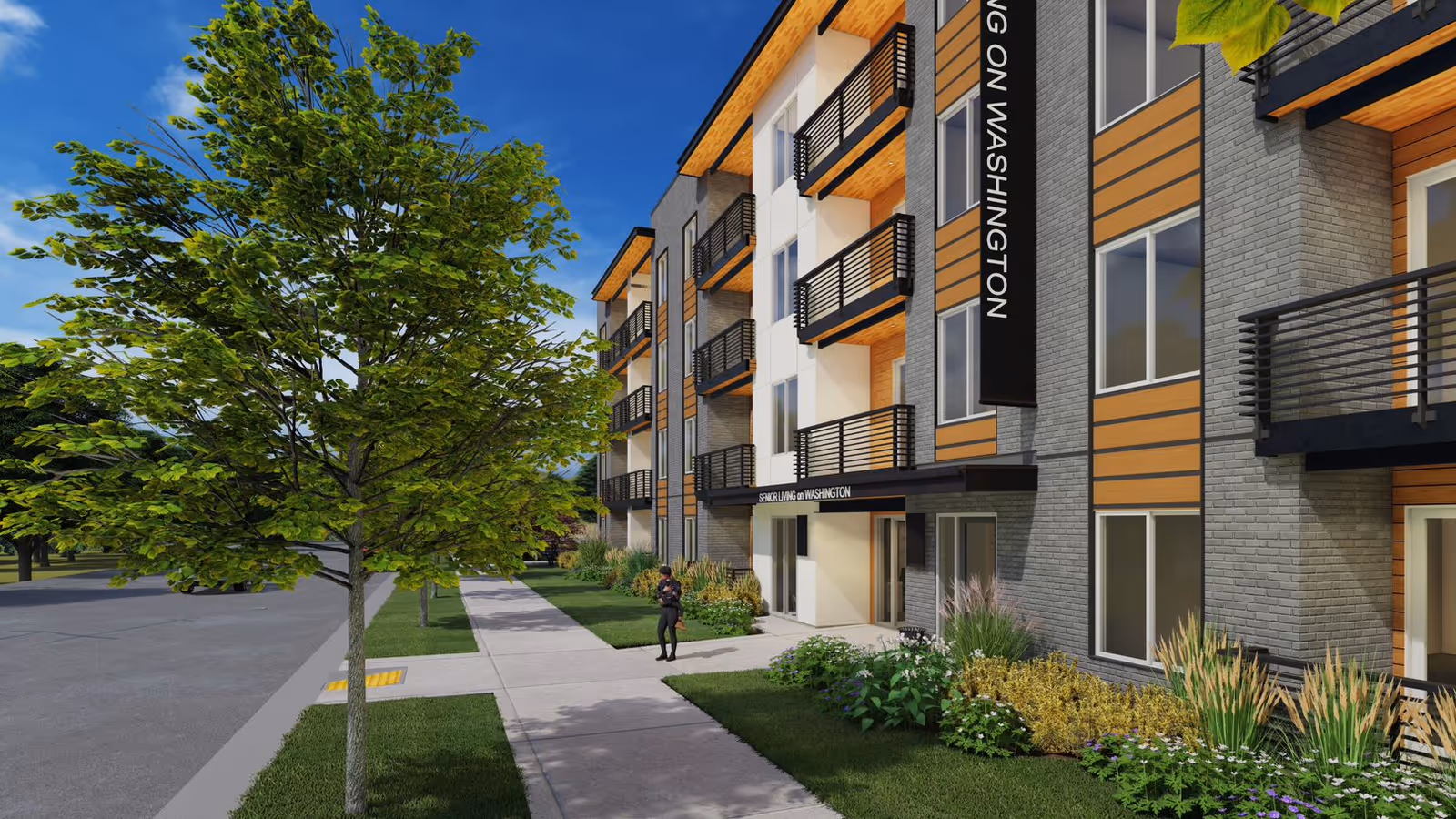 Exterior view of a modern multi-story senior living facility named Senior Living on Washington, featuring balconies, large windows, landscaped greenery, a sidewalk, and a person walking near the entrance.