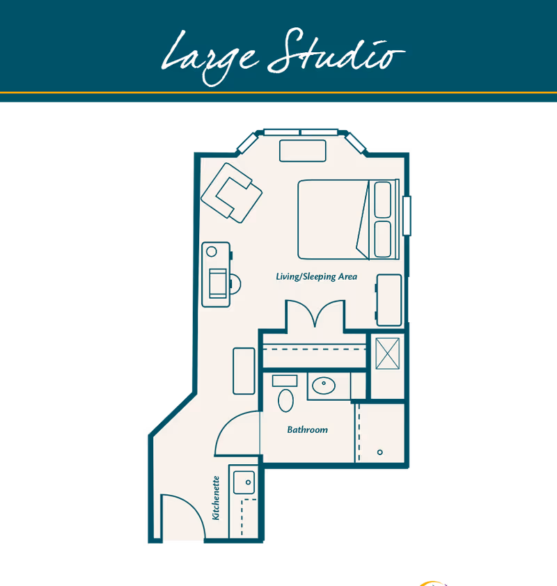 Floor plan of a large studio apartment showing a living/sleeping area with a bed, chair, and dresser, a bathroom with a toilet and sink, and a kitchenette with a sink.