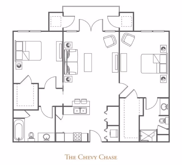 Architectural floor plan of The Chevy Chase unit at The Village of Tanglewood, showing two bedrooms, two bathrooms, a living room with seating, and a kitchen area with appliances and a sink.