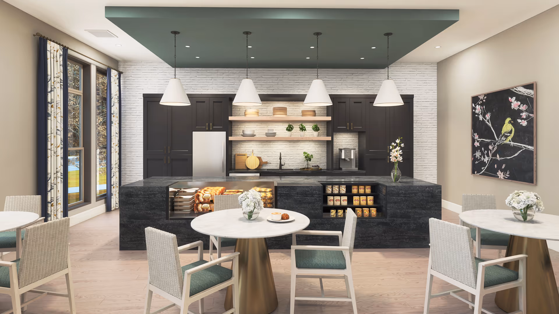 Modern kitchen and dining area with a large dark marble island featuring built-in shelves stocked with bread and canned goods. The kitchen has dark cabinets, a stainless steel refrigerator, open shelves with plants and dishes, and four pendant lights hanging from a green ceiling. There are round dining tables with white marble tops and chairs with green cushions. Large windows with floral curtains let in natural light, and a painting of a yellow bird on a branch hangs on the wall.