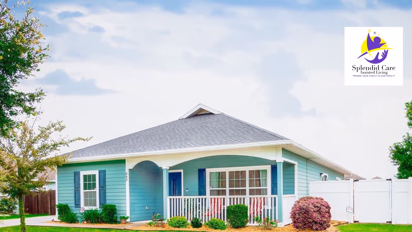 Front exterior of a single-story teal assisted-living house with a covered porch and white railing.