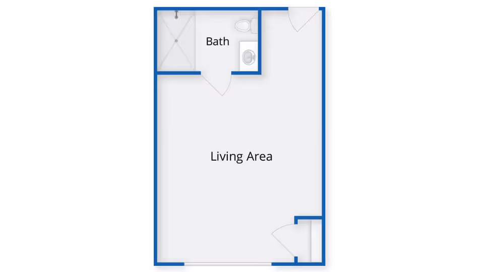 Floor plan of a unit at The Atrium at Veronica Drive showing a living area and a bathroom with a shower, toilet, and sink.