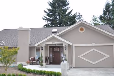 Front view of Abundant Life Elderly Care facility with a welcoming porch