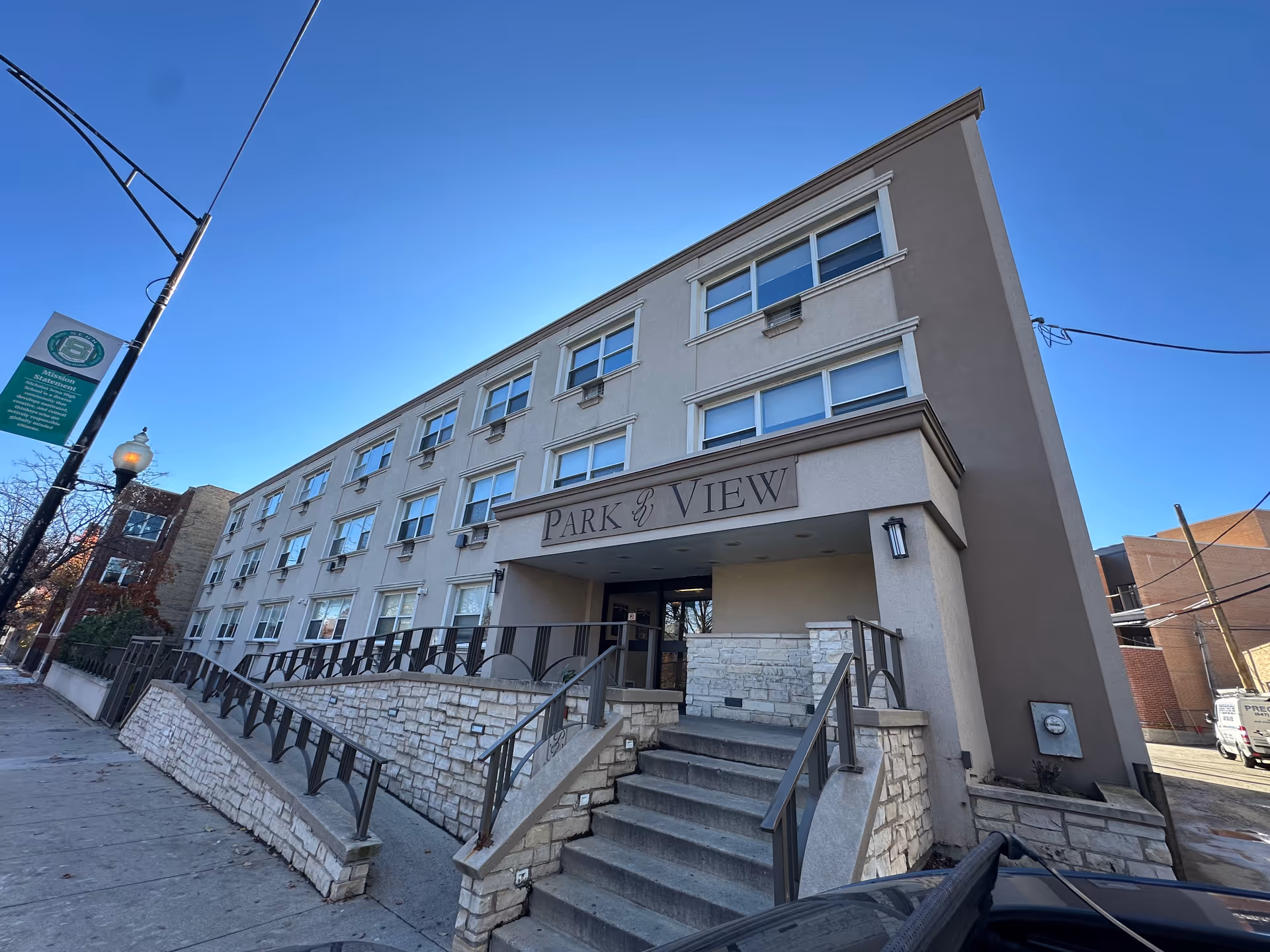 Front exterior of a multi-story building labeled 'Park View' with steps and a ramp leading to the entrance.