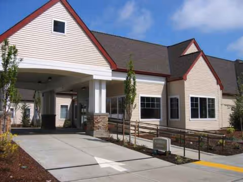 Front view of Avamere Rehabilitation of Hillsboro exterior with entrance canopy and walkway.