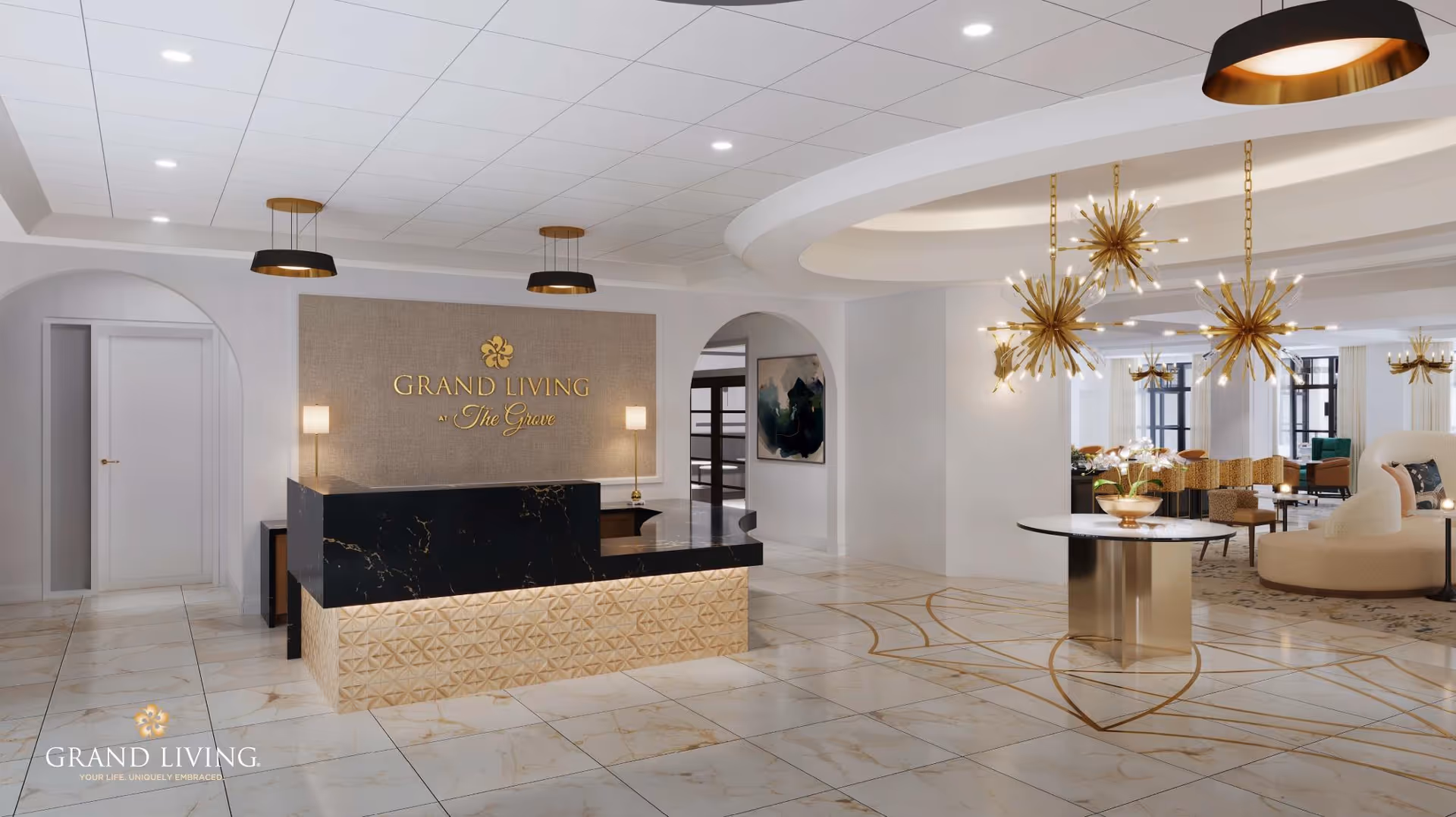Reception area of Grand Living at The Grove featuring a modern black and gold front desk, elegant lighting fixtures, and a spacious seating area with contemporary furniture in the background.