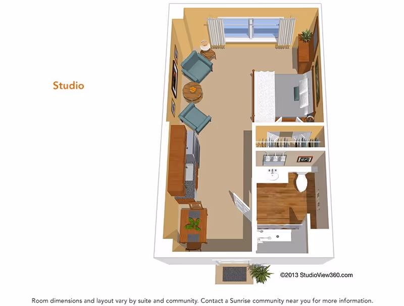 3D floor plan of a studio apartment featuring a combined living and sleeping area with a bed, two chairs, a small round table, a dresser, and a window with curtains. The apartment also includes a kitchenette with cabinets, a sink, and a small dining table with a chair. There is a separate bathroom with a sink, toilet, and shower. The entrance has a small mat and a plant nearby.