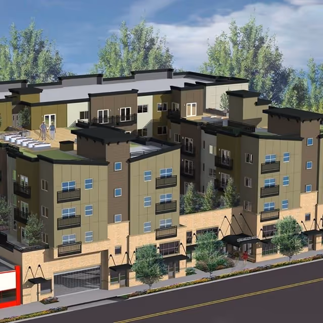 A digital rendering of a multi-story senior living facility named The Savoy at Lake City, featuring modern architecture with balconies, rooftop terraces, and surrounding trees along a street with sidewalks and greenery.